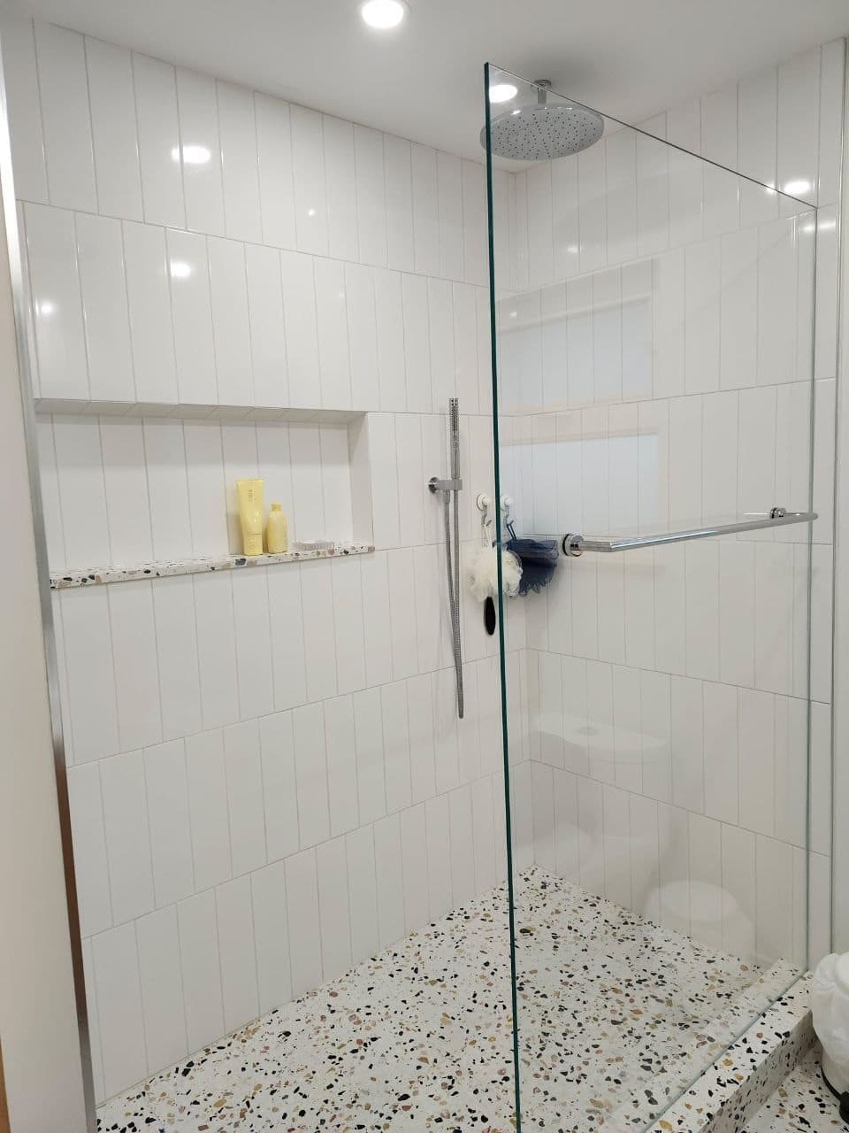 Glass Walk-in Shower — Frameless glass, terrazzo pan