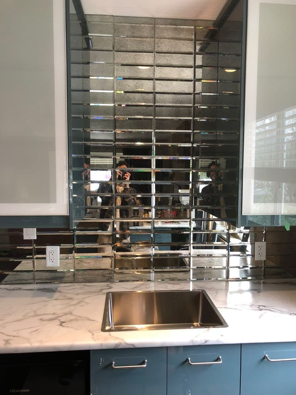 Mirror Tile Backsplash — Mirrored brick over marble